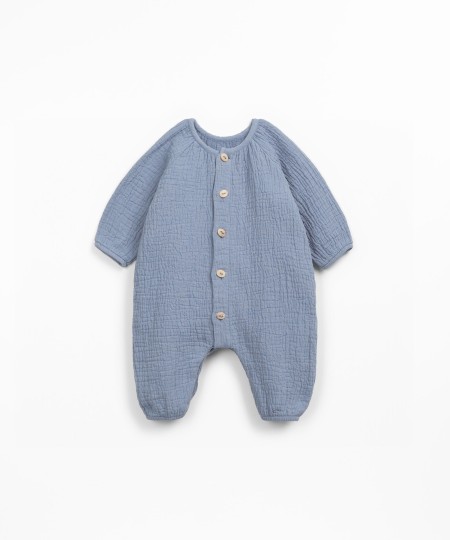 Macac�o de tecido em fibras naturais