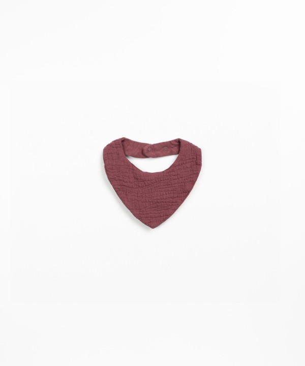 Bib with snap button fastening