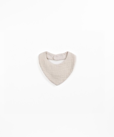 Bib with snap fastening