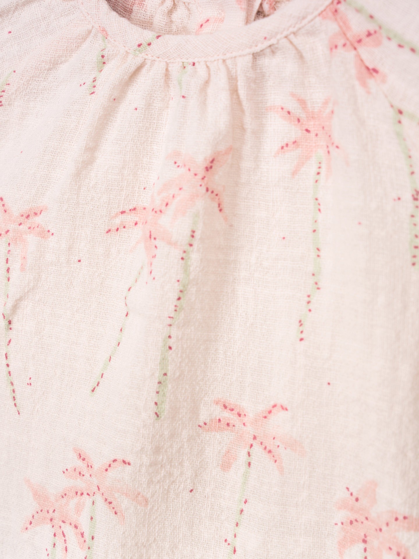 Blusa in tessuto con stampa di palme