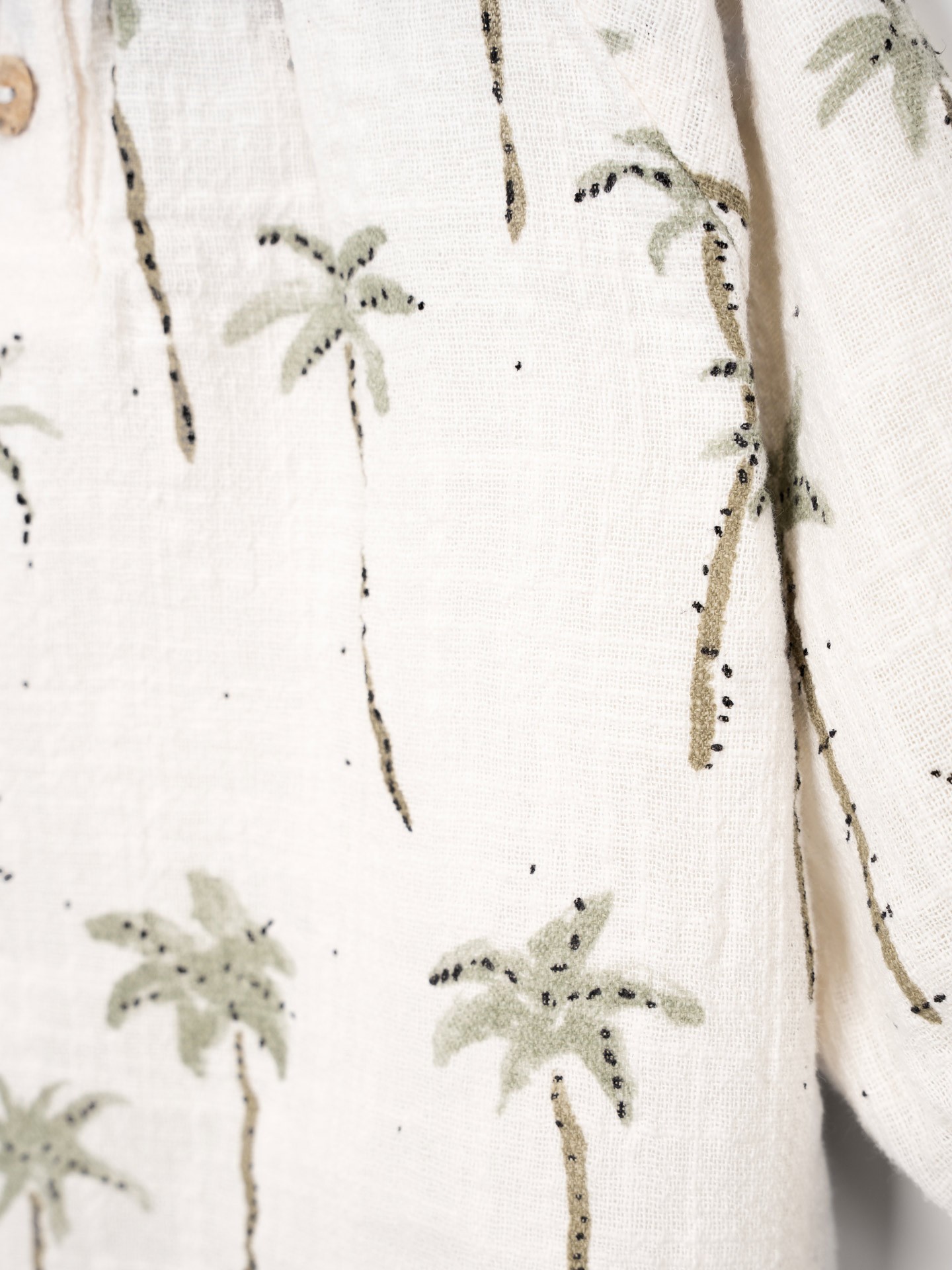 Blusa in tessuto con stampa di palme