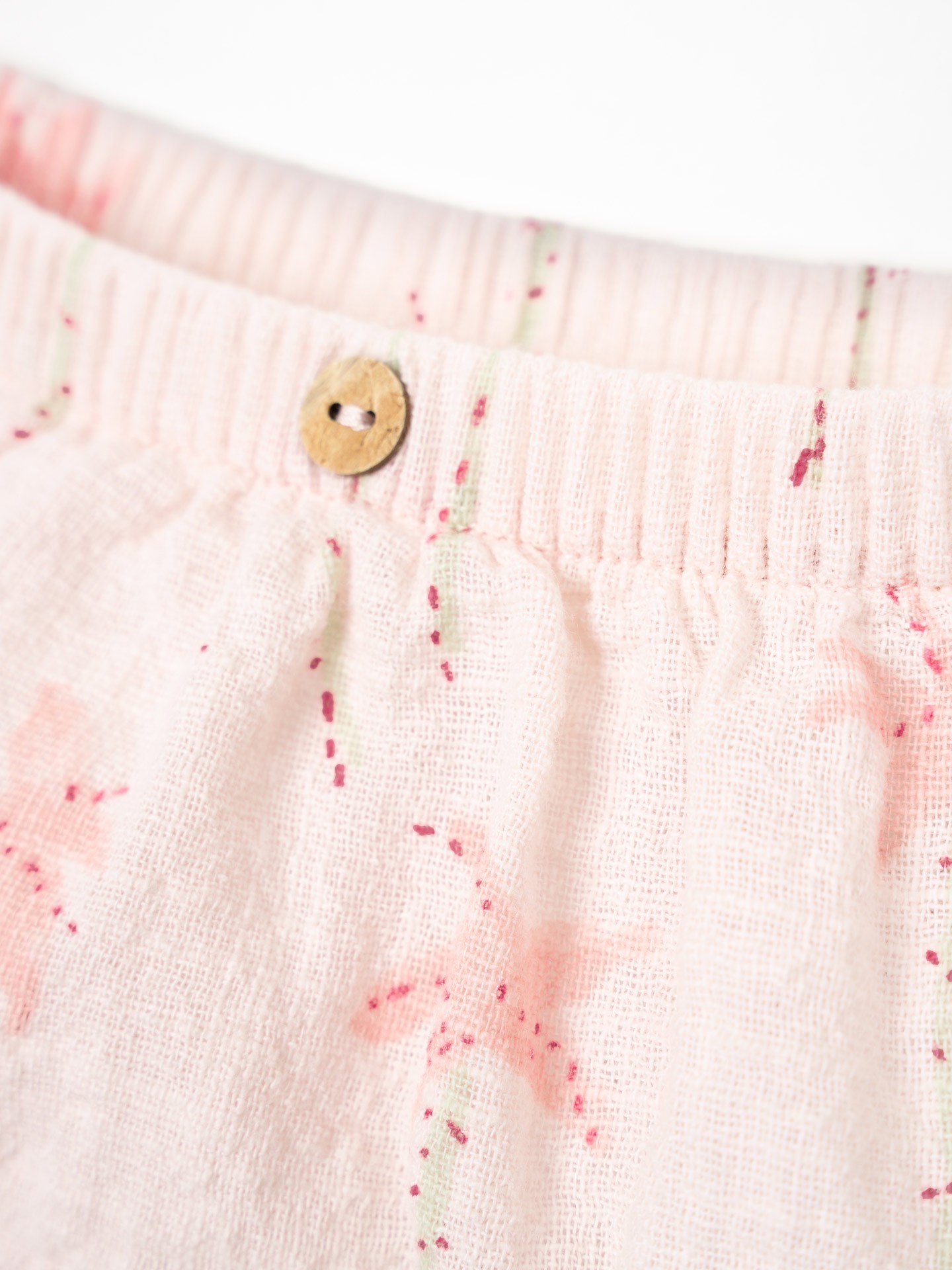 Pantaloncini in cotone biologico con stampa di palme