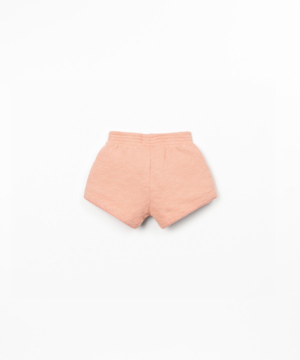 Pantaloncini con cintura elastica e fiocco decorativo