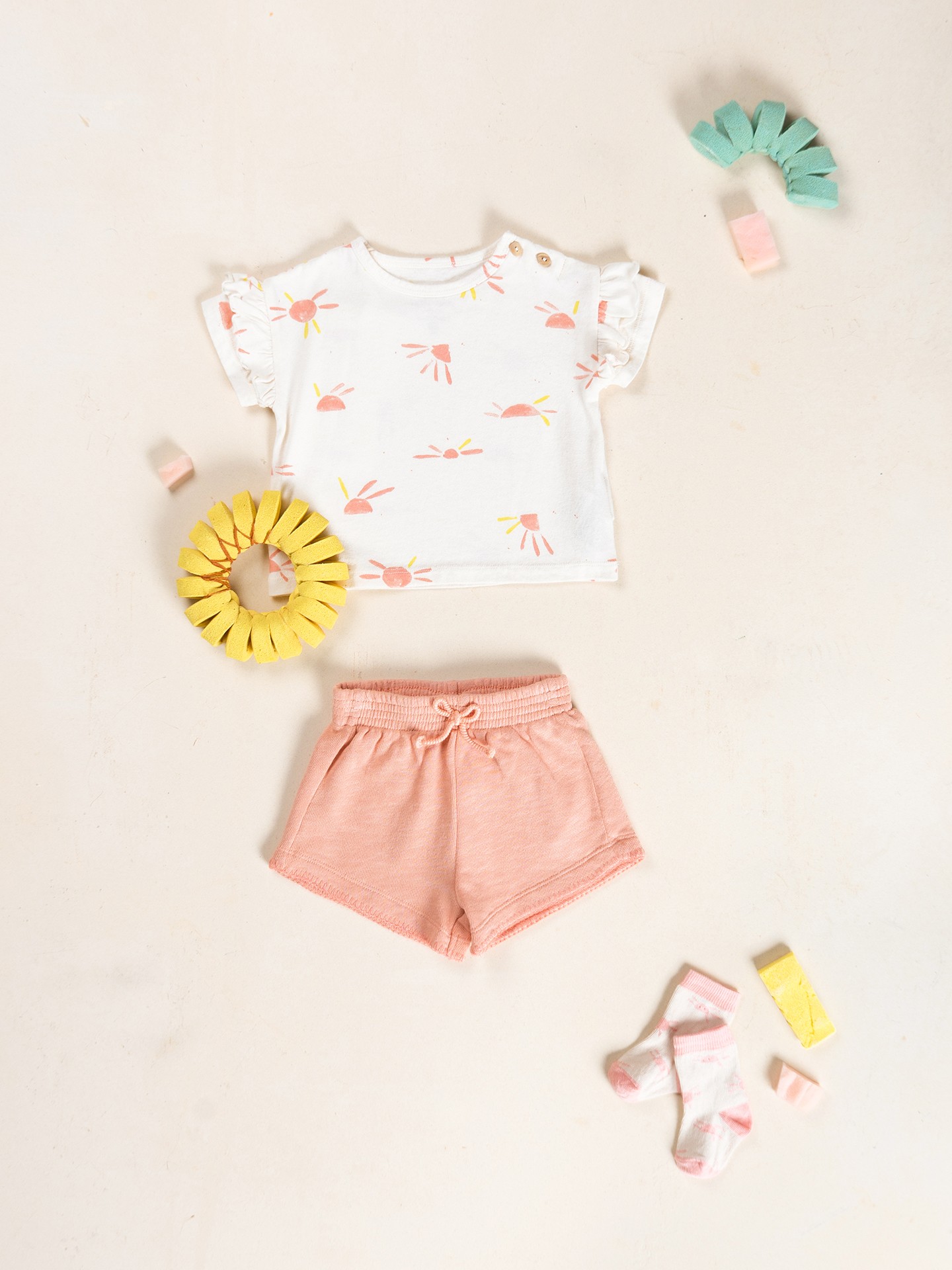 Pantaloncini con cintura elastica e fiocco decorativo