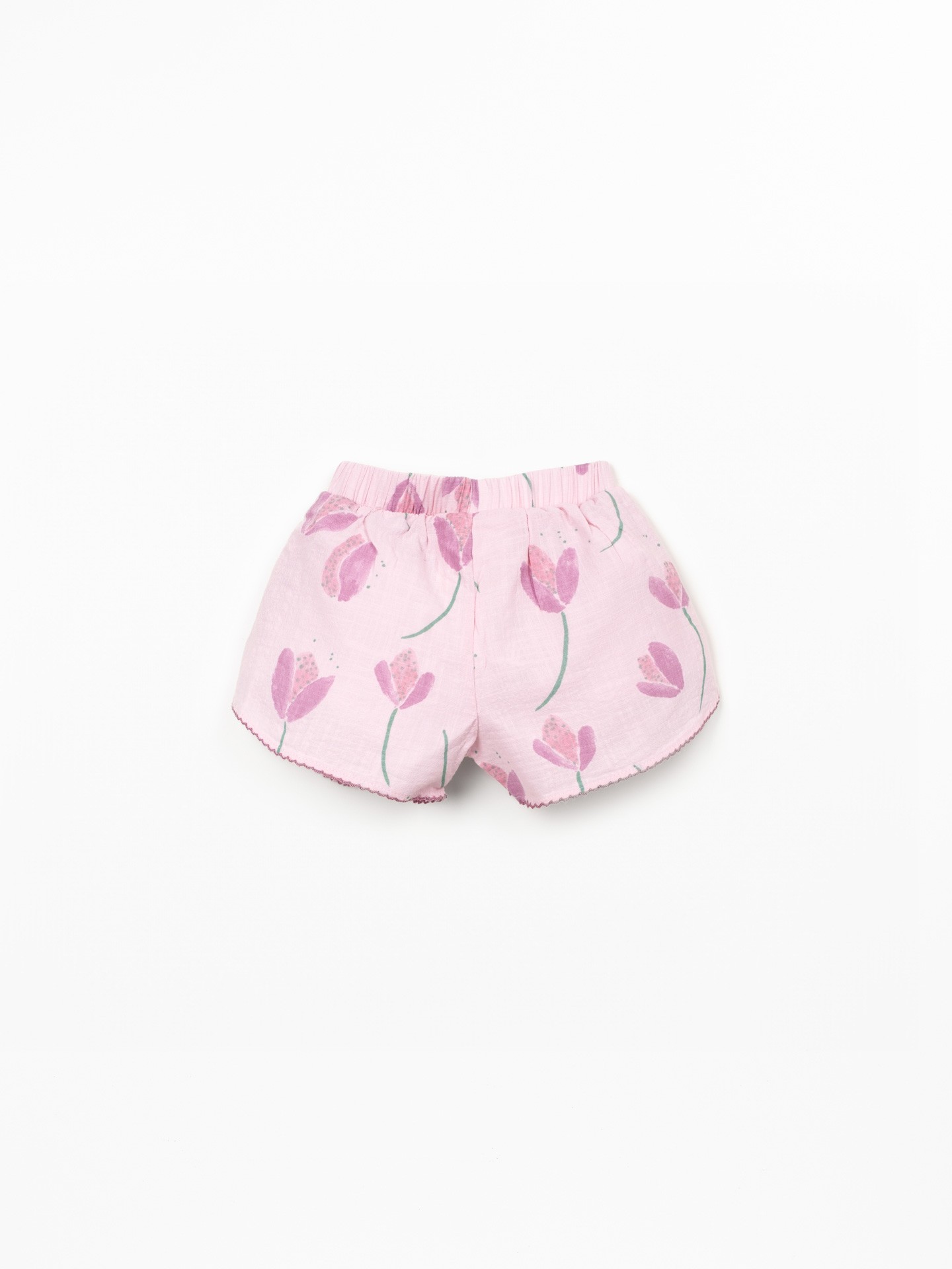 Pantalón corto de tela con paneles laterales