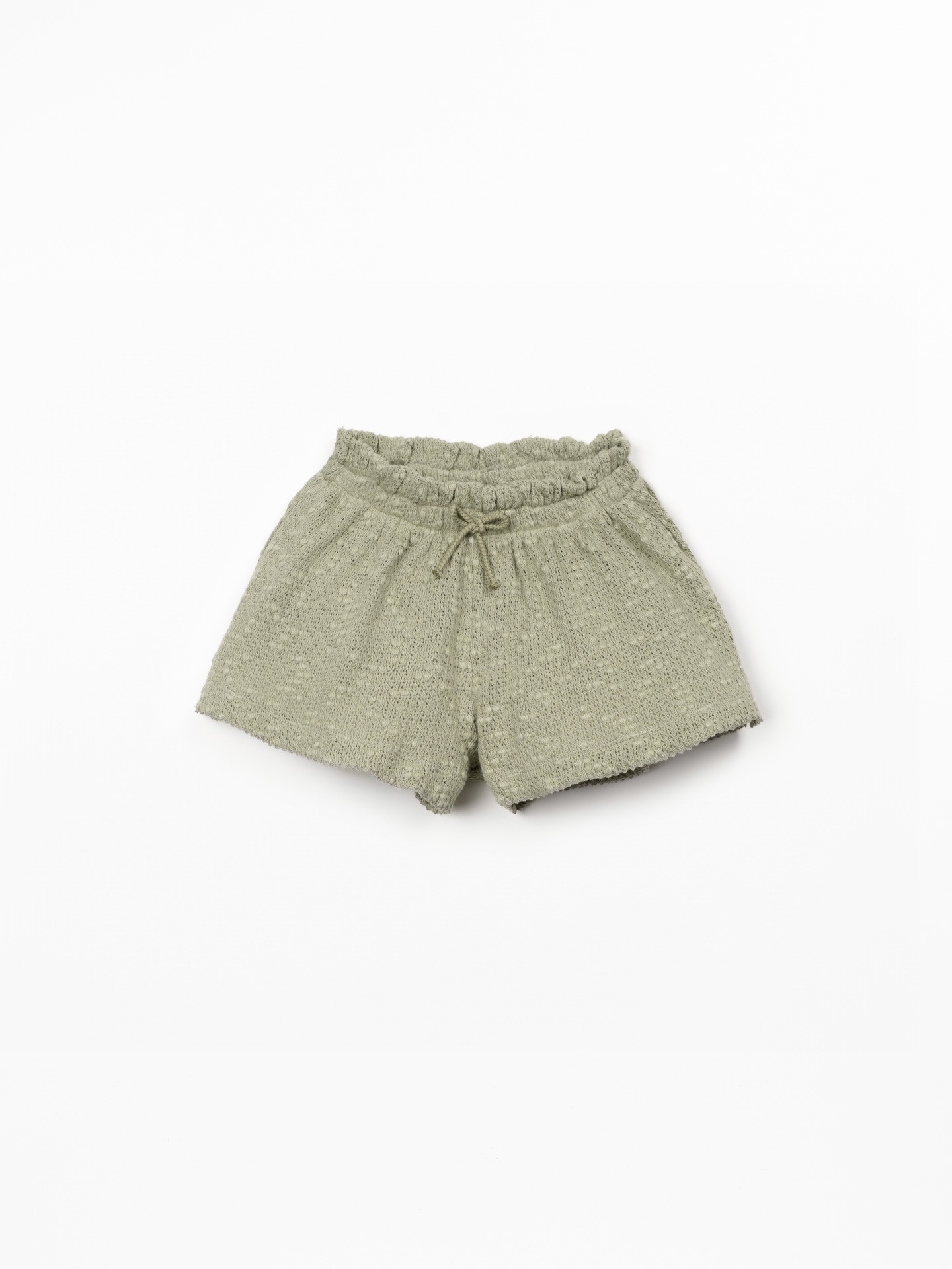 Pantaloncini in maglina effetto crochet