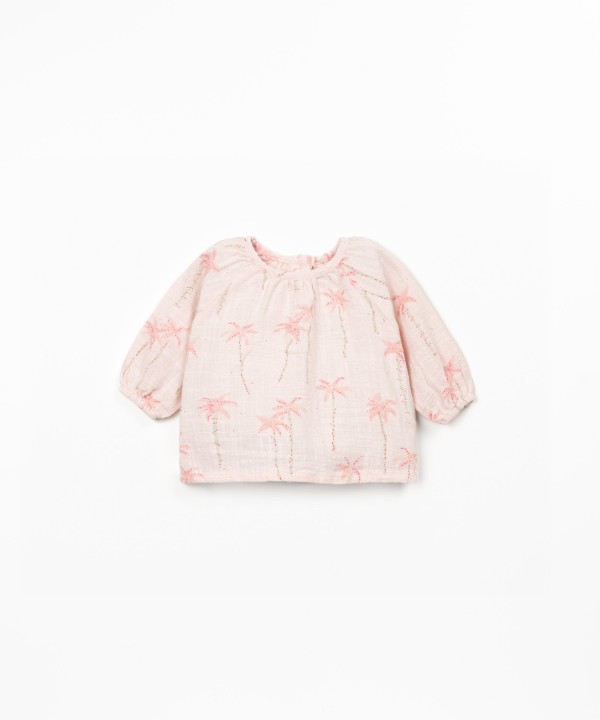 Fabric blouse with palm tree print