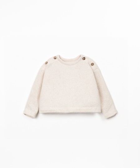 Jumper in a blend of natural and recycled fibers