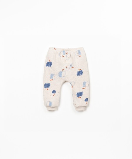 Pantaloni in maglia con stampa di mele