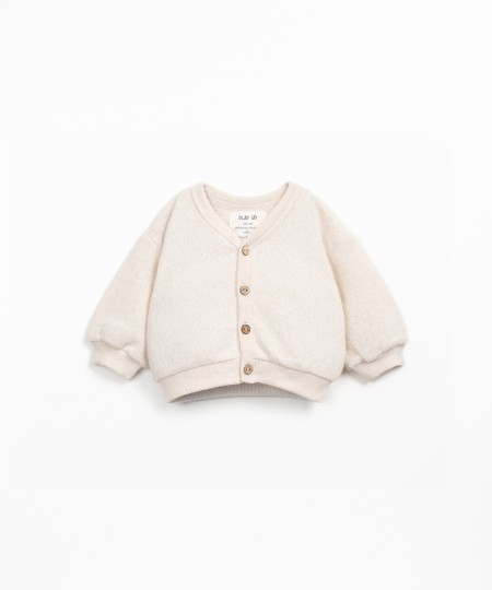 Knit cardigan with Re(Play) yarn