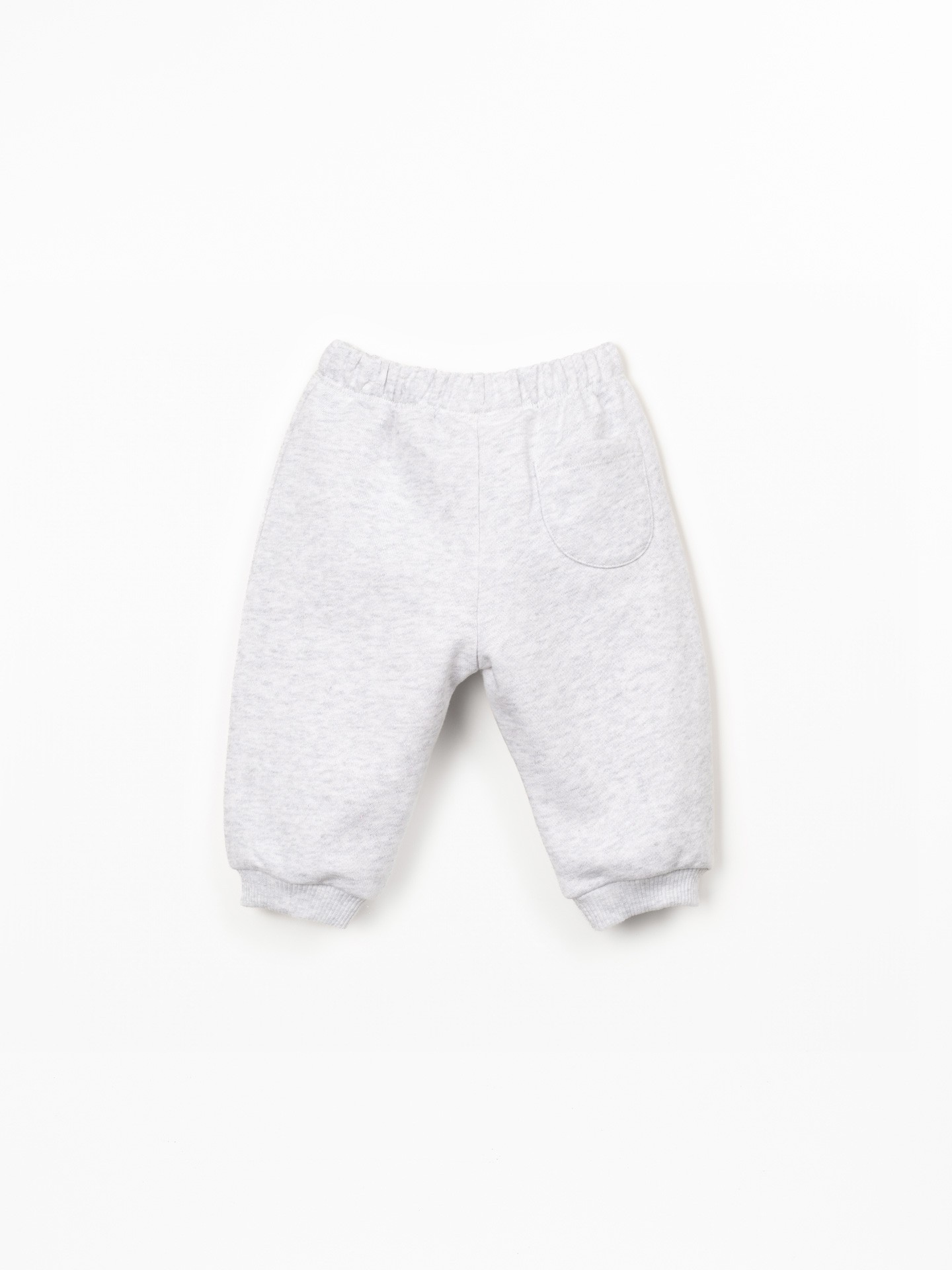 Trousers with decorative drawstring