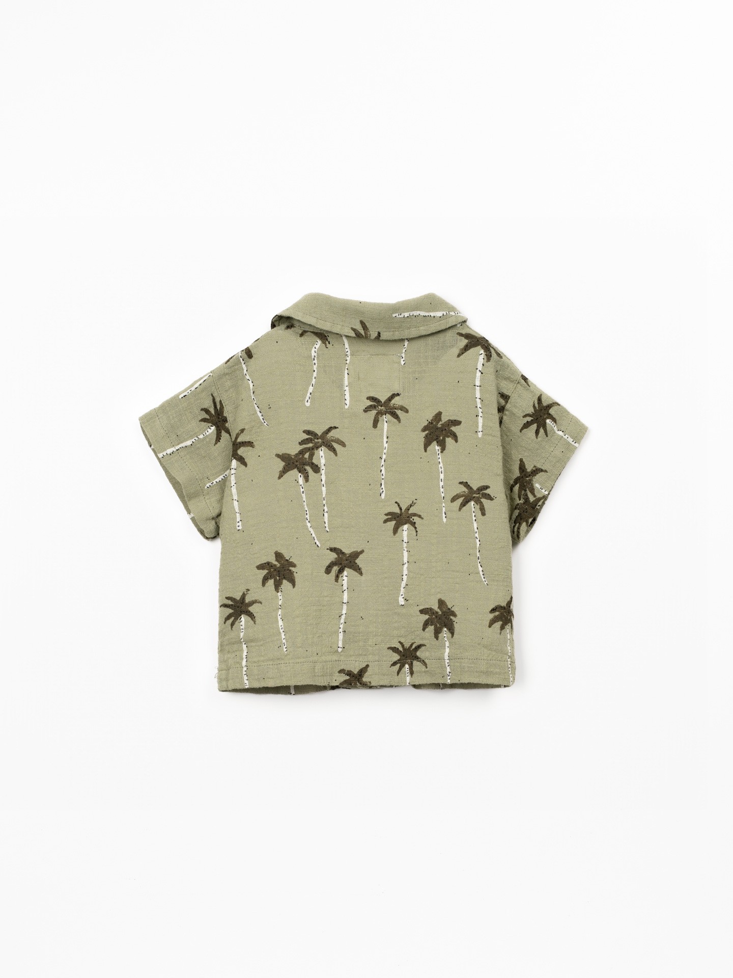 Camisa de algodão orgânico com estampado de palmeiras