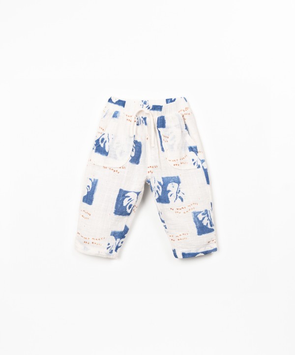 Printed fabric trousers with monstera print