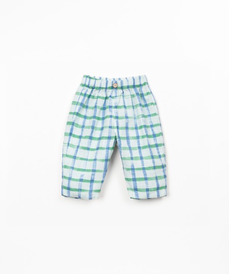 Woven trousers with natural fibers