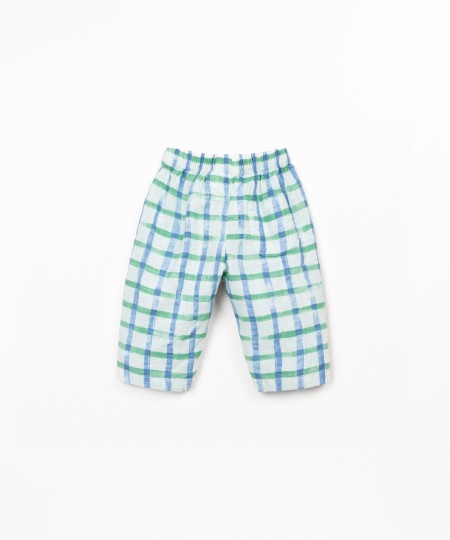 Woven trousers with natural fibers