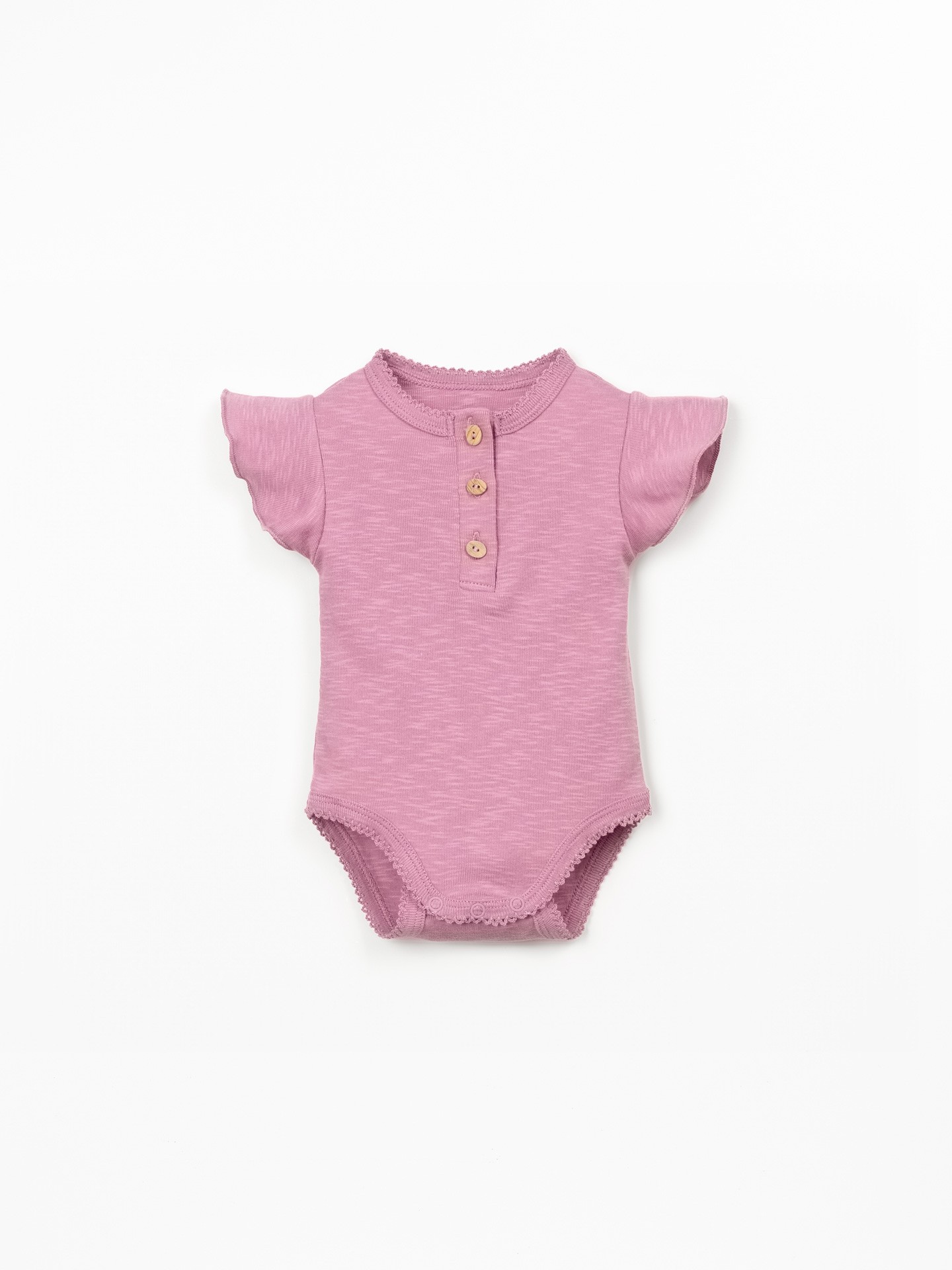 Organic cotton bodysuit with ruffle insert on the sleeve
