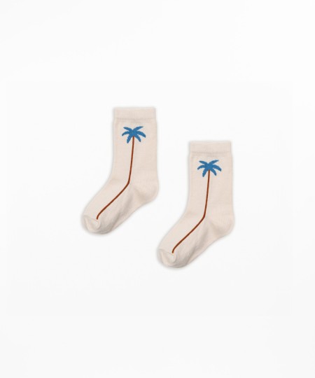 Jacquard socks in organic cotton with palm tree print