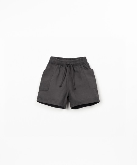 Fabric shorts with adjustable drawstring
