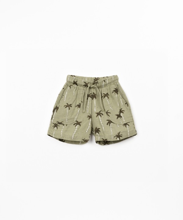 Organic cotton shorts with palm tree print
