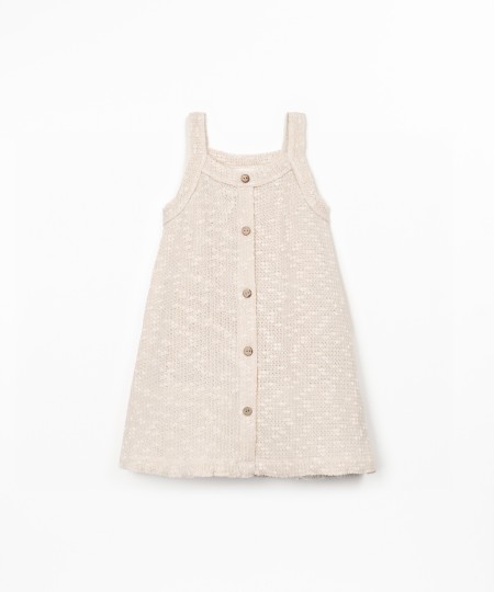 Jersey dress with crochet effect