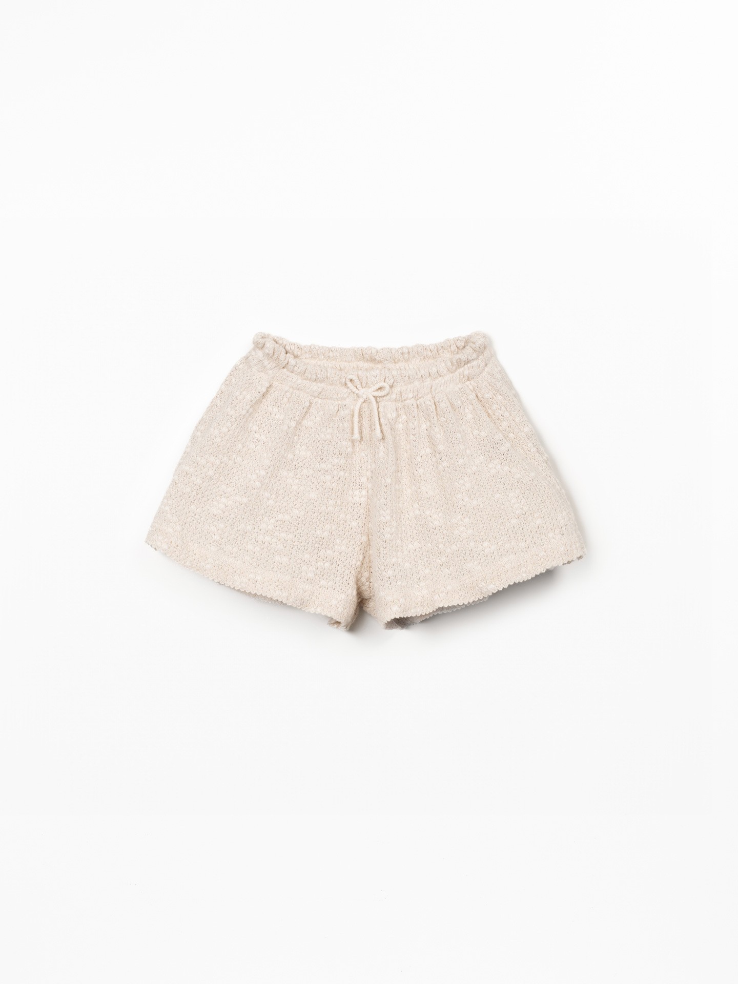 Jersey shorts with crochet effect