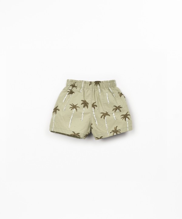 Swim shorts with palm tree print