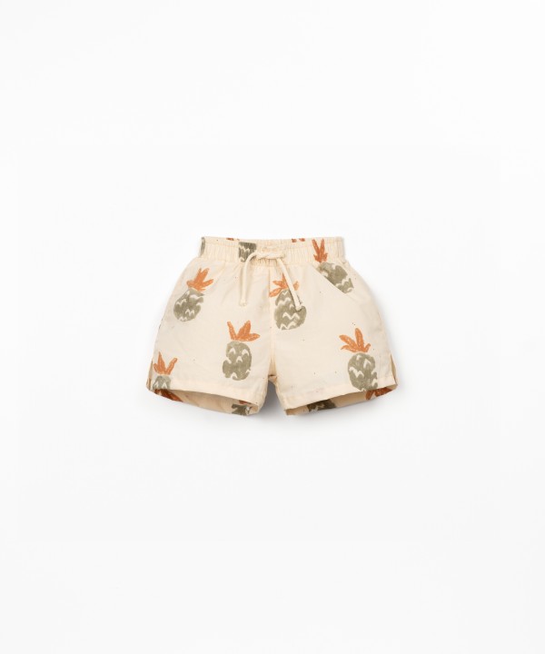 Swim shorts with palm pineapple print