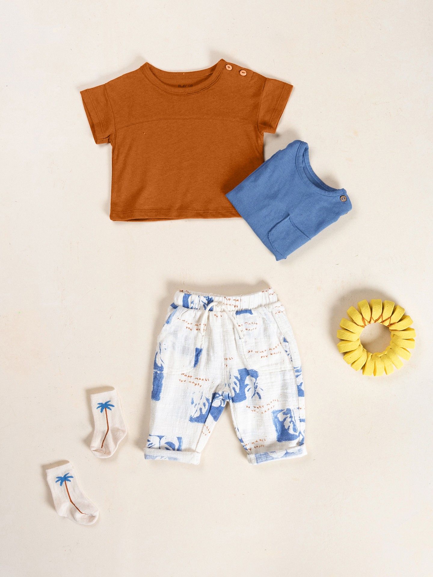 Calça de tecido com estampado de monteras