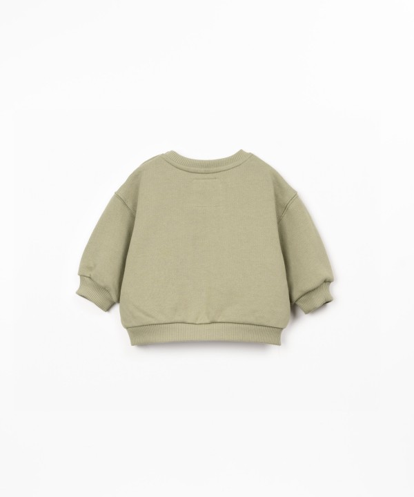 Knitted sweater with natural fibers