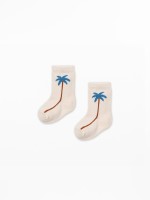 Socks with palm tree pattern