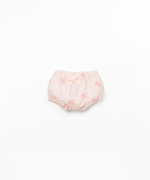 Organic cotton shorts with palm tree print