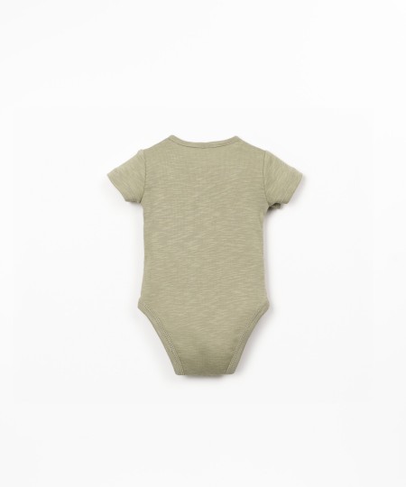 Body de algodón orgánico con mangas cortas