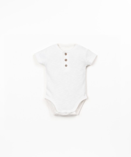 Body de algodón orgánico con manga corta
