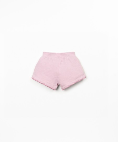 Shorts con cintura elastica e fiocco decorativo