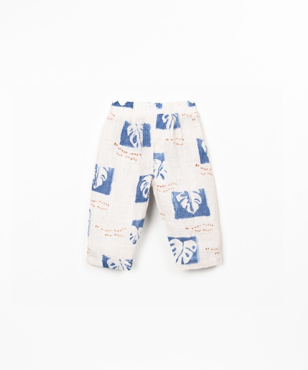 Printed fabric trousers with monstera print