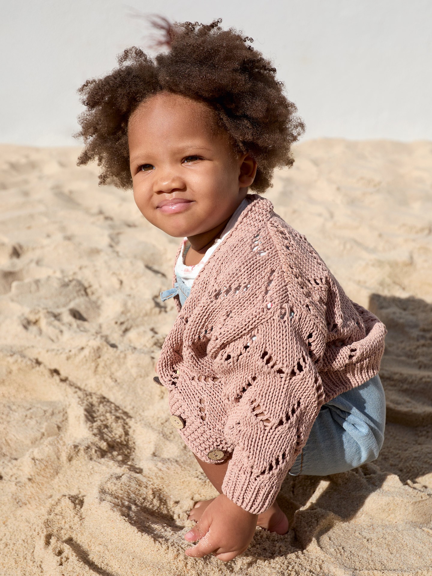 Veste en tricot avec boutons en coco
