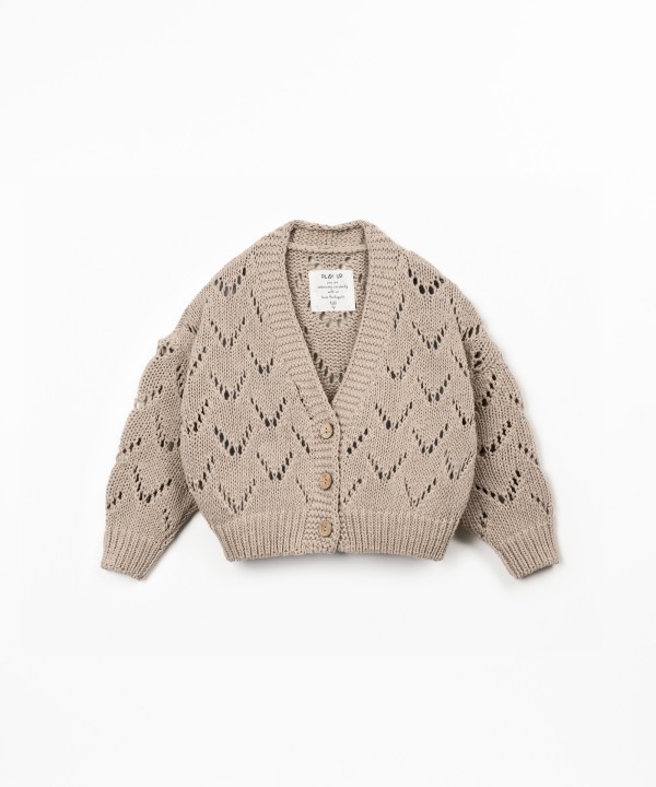 Veste en tricot avec boutons en coco