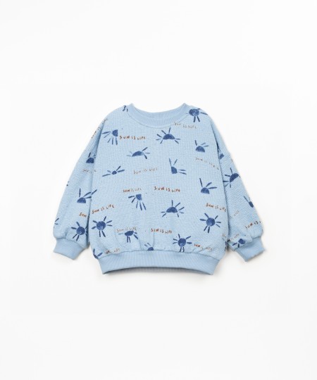 Pull avec imprim� soleil