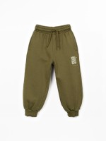 Trousers in natural fibers with design