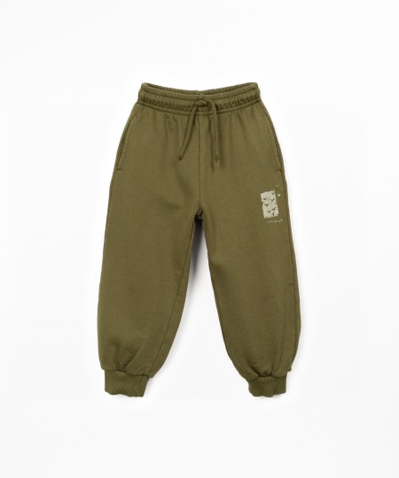 Trousers in natural fibers with design