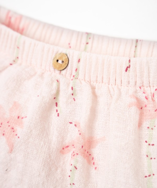 Cal��o de algod�o org�nico com estampado de palmeiras