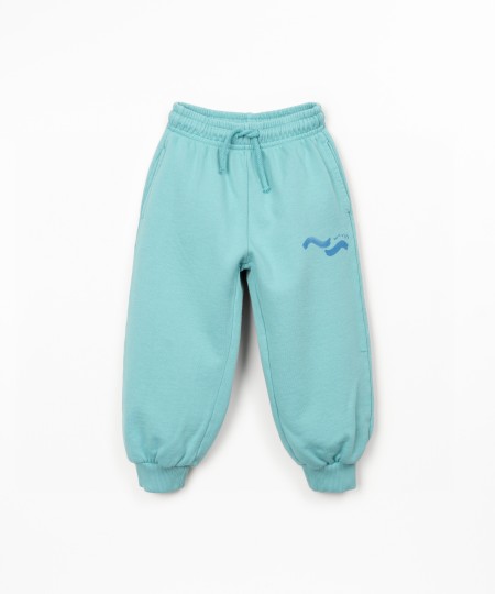 Trousers in natural fibers with print