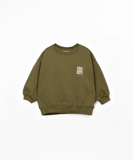 Sweat-shirt avec illustration dans le dos