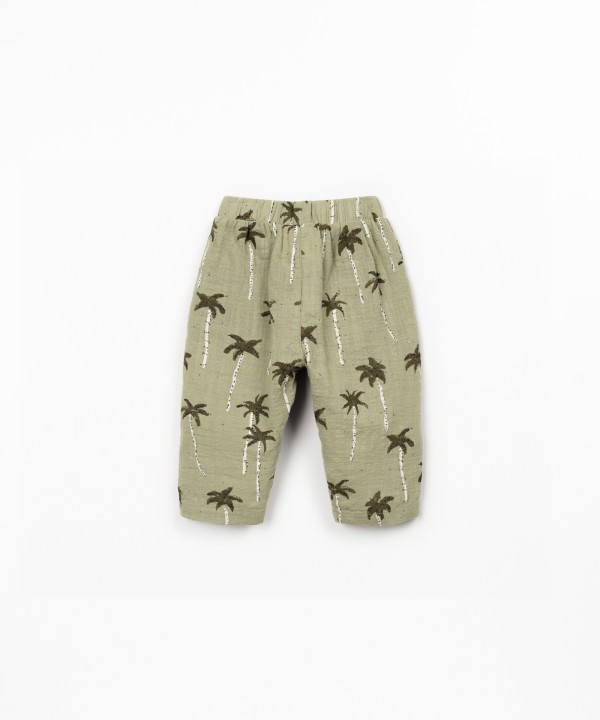 Pantaloni in tessuto con stampa di palme