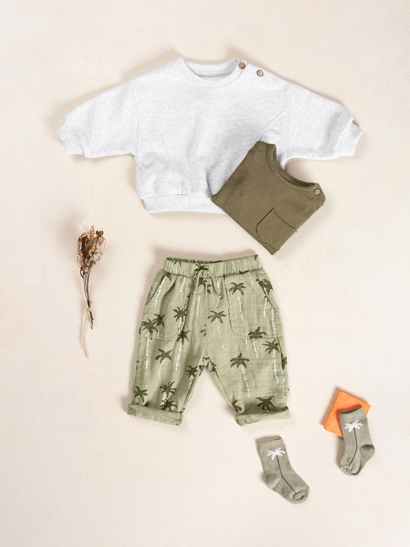 Pantaloni in tessuto con stampa di palme