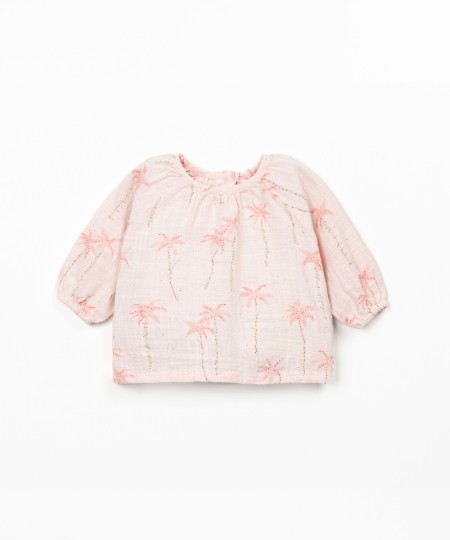 Fabric blouse with palm tree print