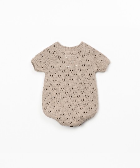 Knitted jumpsuit in cotton and recycled cotton blend