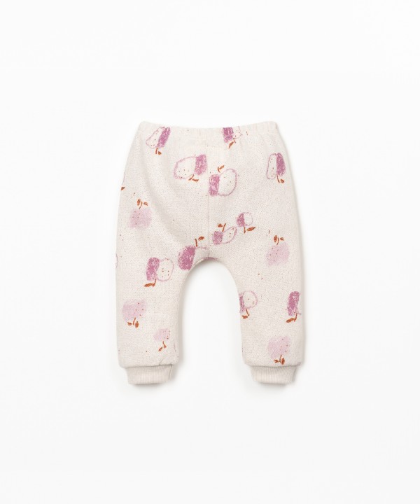 Knit trousers with apple print