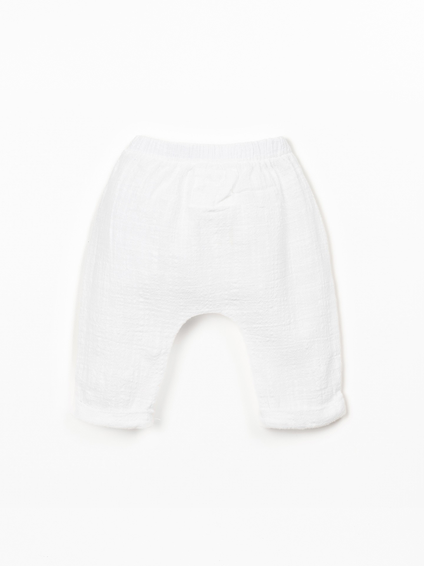 Calça de tecido em algodão orgânico