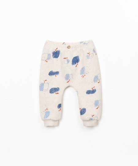 Calça de malha com estampado de maças